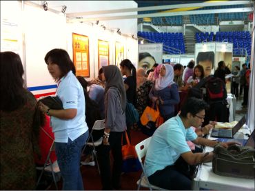 Jobseekers registering and applying jobs at MyStarJob.com booth during the Penang Career & Postgraduate Expo last year