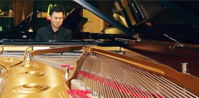Play on: Wong is most at ease when he plays the piano. 