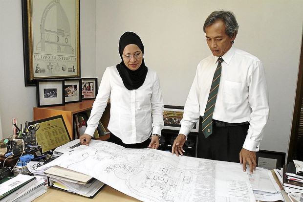 Climbing the ladder: Understanding research material instantly is important to architects Abdul Khalid and Zaiha.