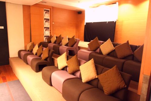 The AV and presentation room gives off a warm and inviting vibe.