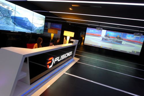 The Fusionex lobby houses a large projector screening area.