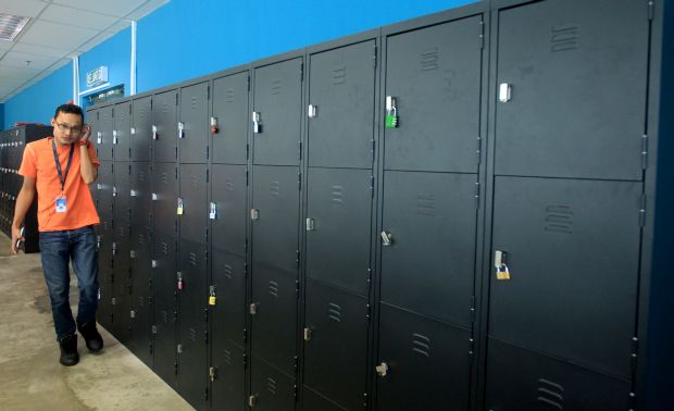 The official workstations are open, with lockers provided on the side.